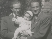 Moshe holding the baby Lea 1948